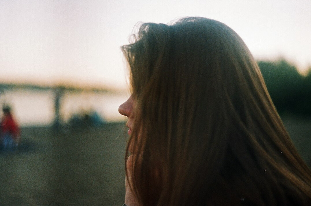 Portrait of a young woman with long hair