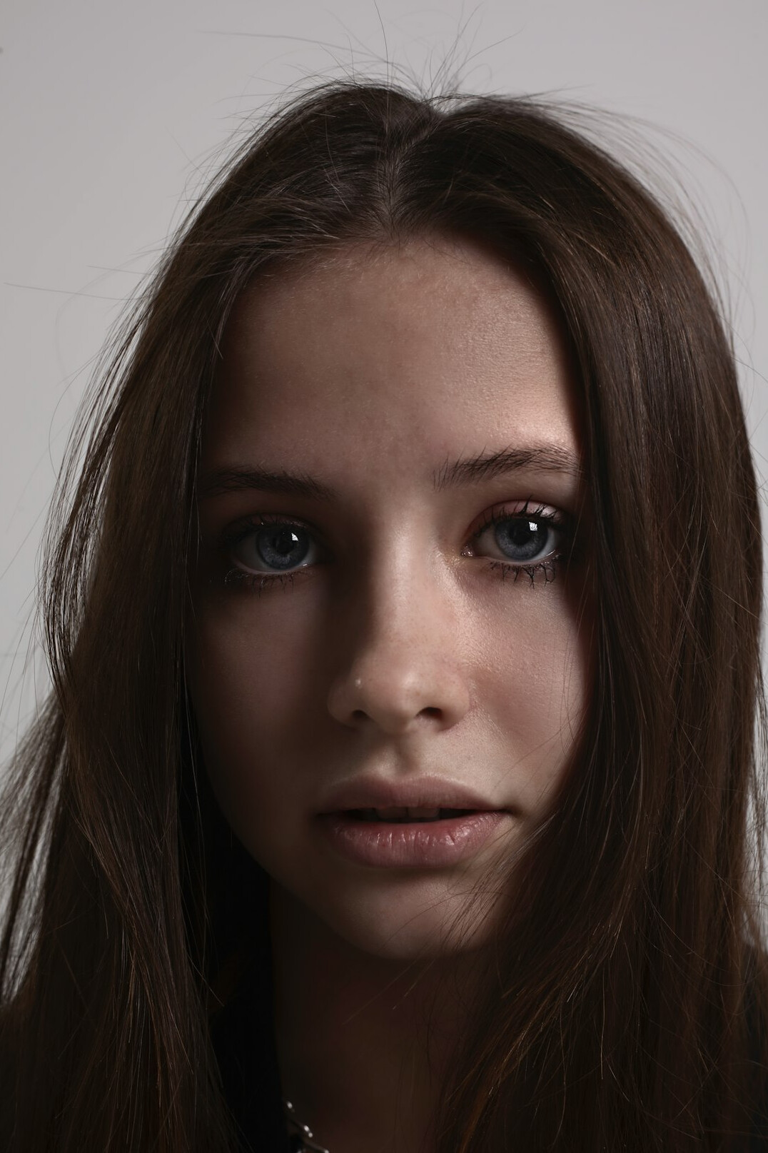 Portrait of a smiling woman with brown hair